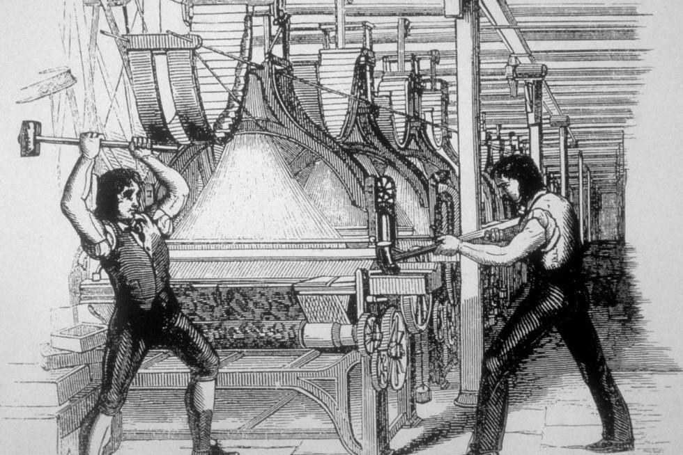 An engraving of Luddites smashing textile machinery